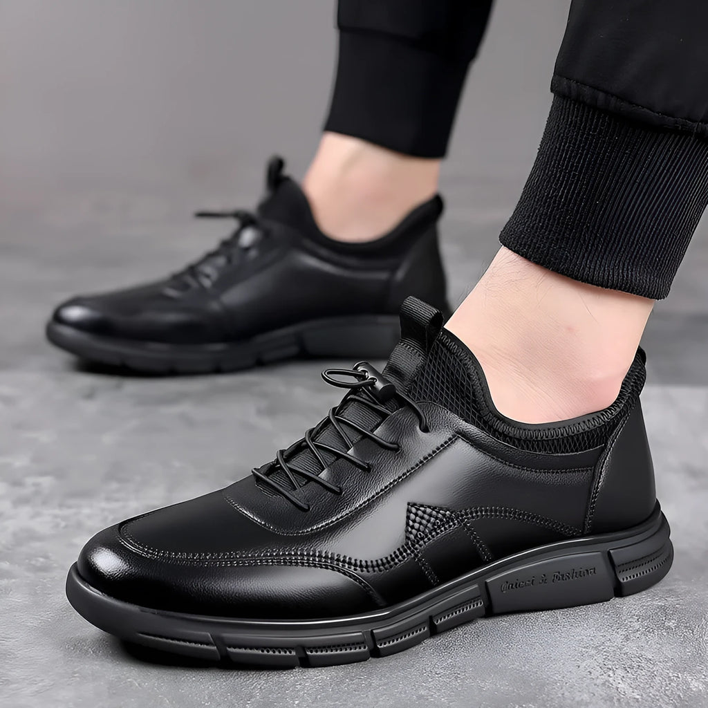 Black men's casual leather business shoes with a rubber sole and square heel.