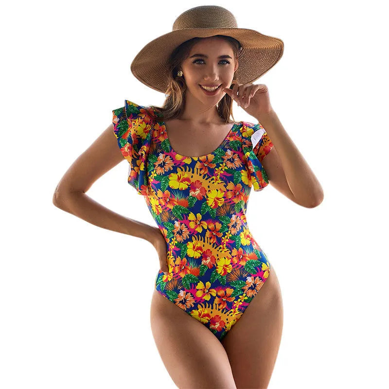 Women's one-piece swimsuit with U-shaped neckline and lace detailing on polyester fabric.