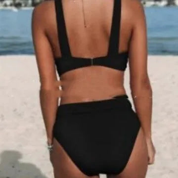 Solid colour women's bikini set on a hanger, showing slim fit top and bottom.