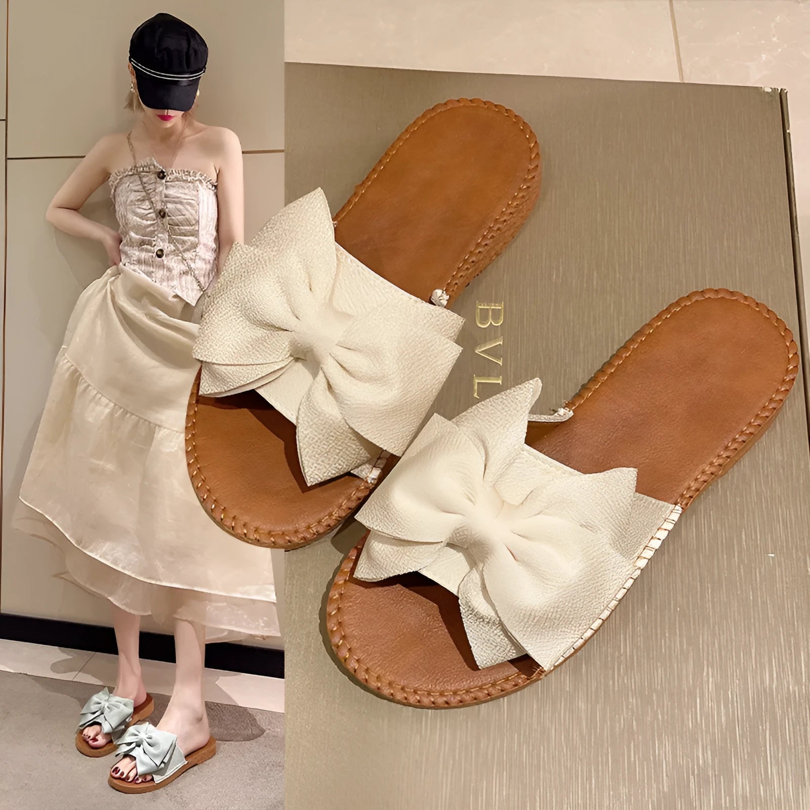 Women's beige slip-on sandals with bow detail and flat rubber sole