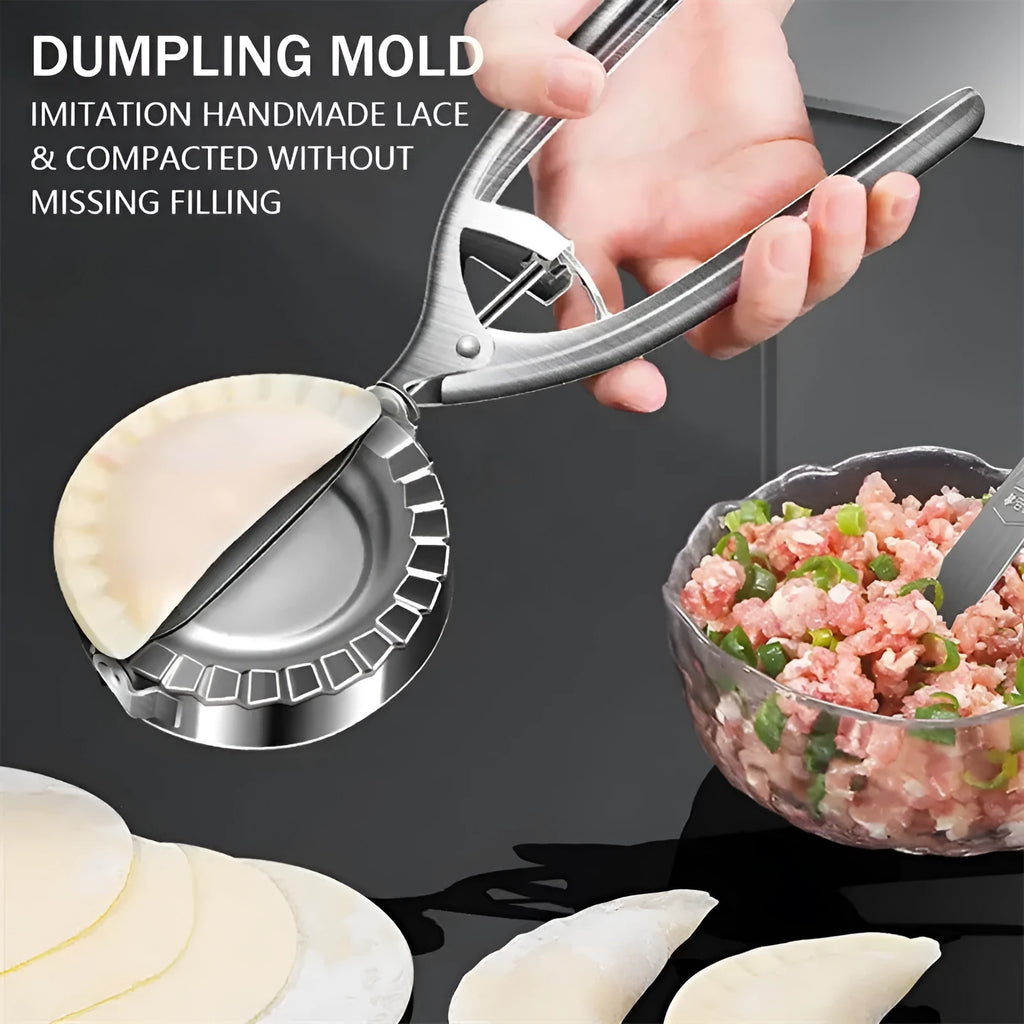 Silver-colour stainless steel manual dumpling mould on a kitchen counter.