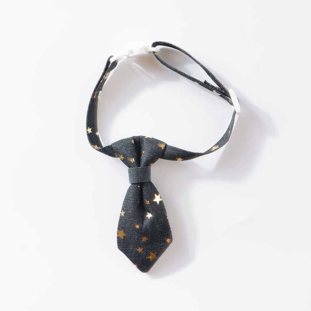 Designer dog collar with golden star decoration on adjustable strap, black colour, S size