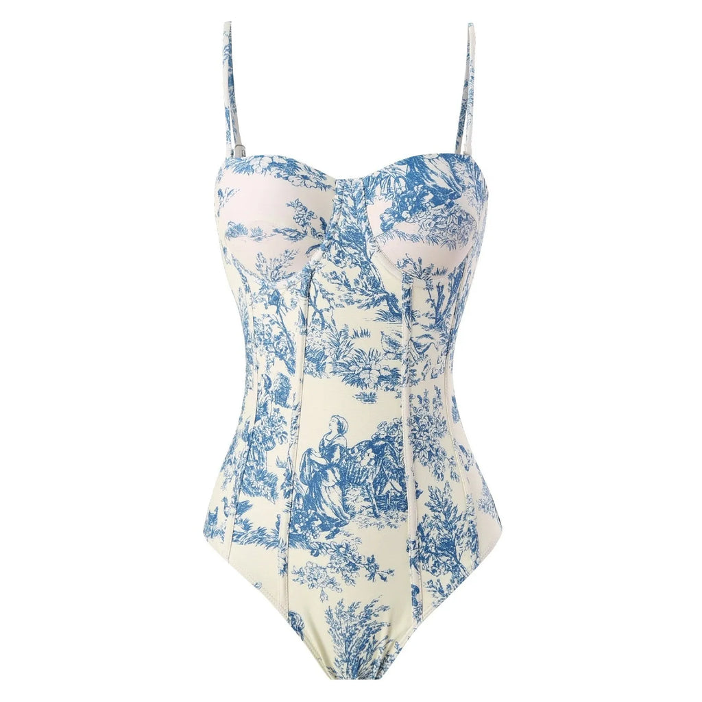 Blue patterned women's one-piece swimsuit with matching gauze skirt shown in multiple size options
