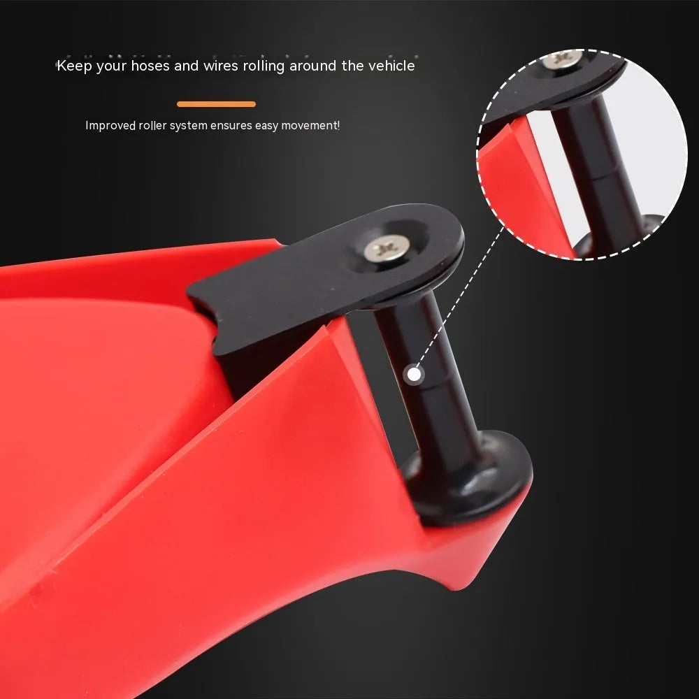 Four red triangular plastic car parking blocks with non-slip rubber surfaces