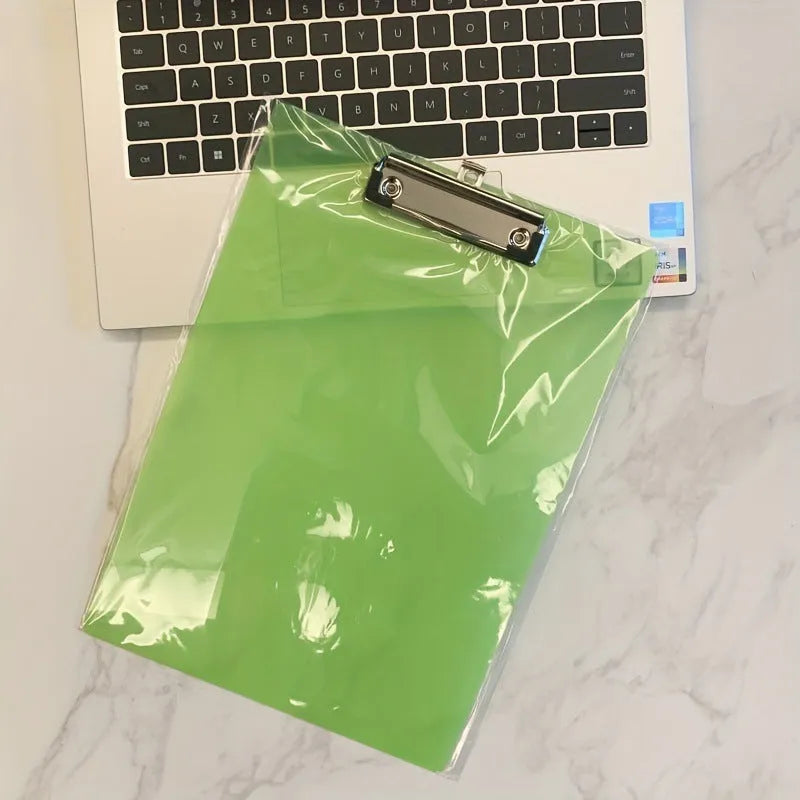 Transparent A4 writing board pad with metal clip holding paper, shown in blue colour option