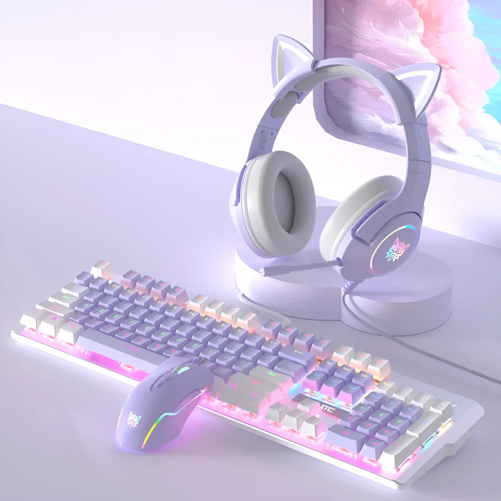 White and purple backlit wired mechanical keyboard and mouse gaming bundle on a desk.