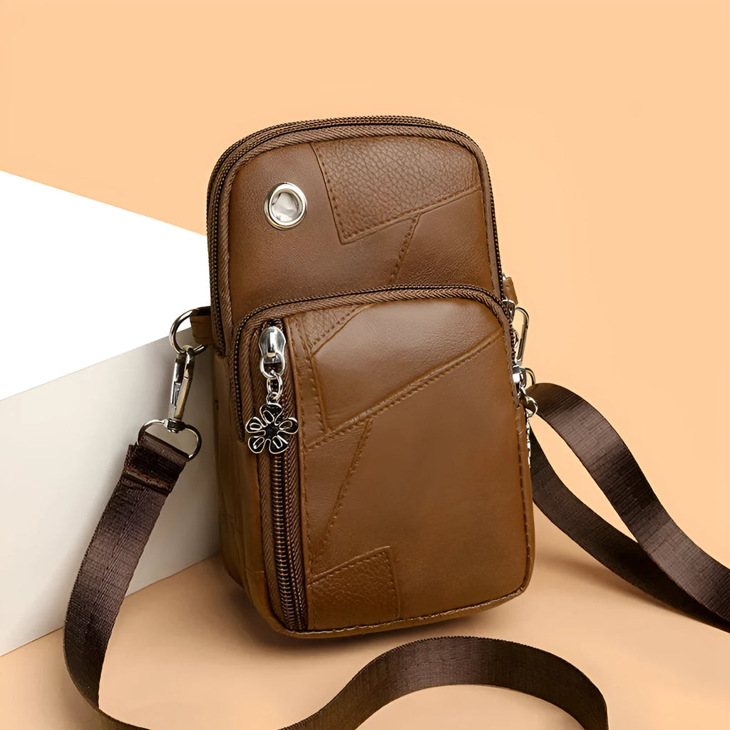Vertical square mini phone bag in four colour options with sandwich pocket design