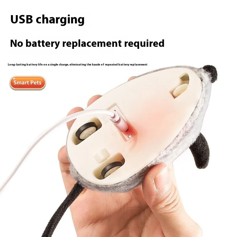 Grey plastic electric cat toy mouse with feather tail decoration and USB charging cable