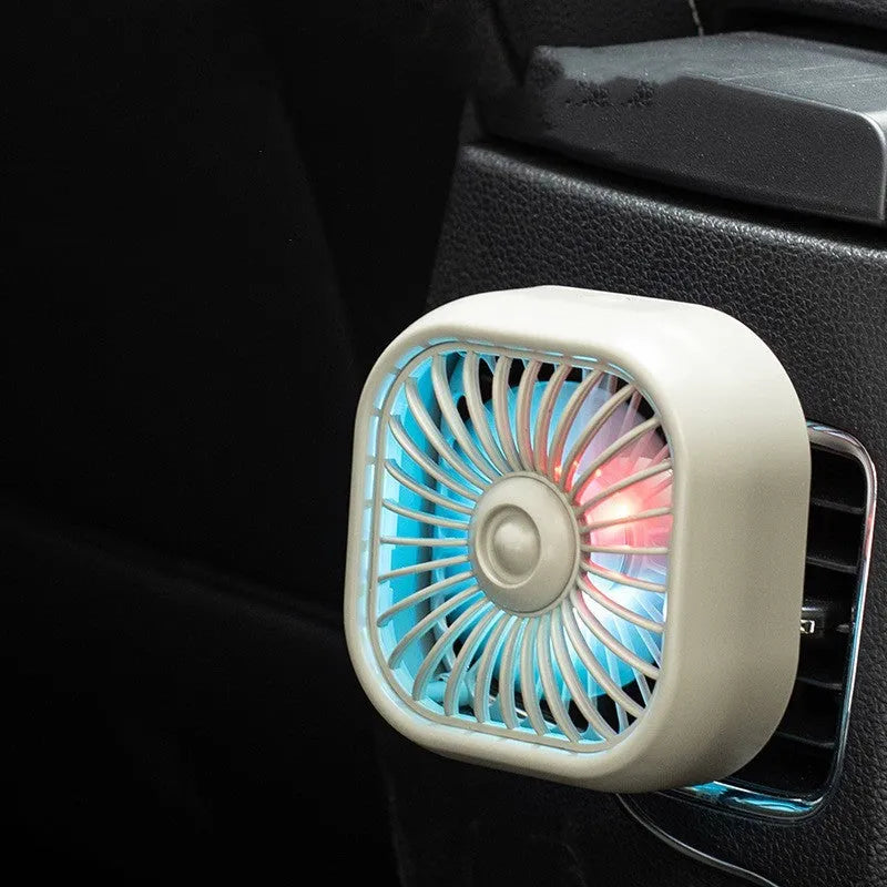 Small black USB car fan with three-speed keyboard controls on compact base