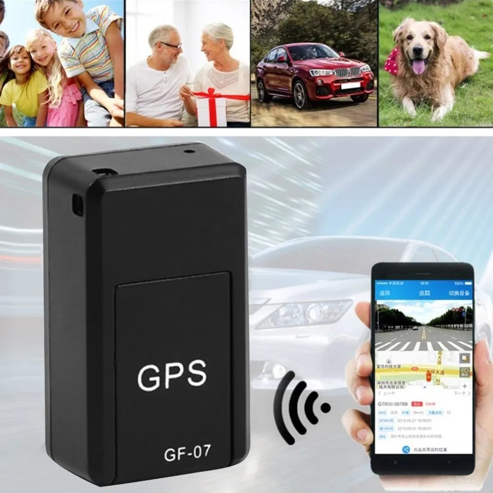Small black magnetic GPS car tracker with USB charging cable on a metal surface.
