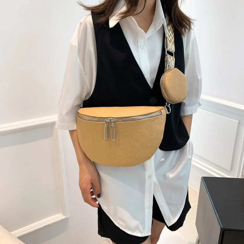 Women's PU leather crossbody bag with clamshell opening in solid colour with zipper texture details