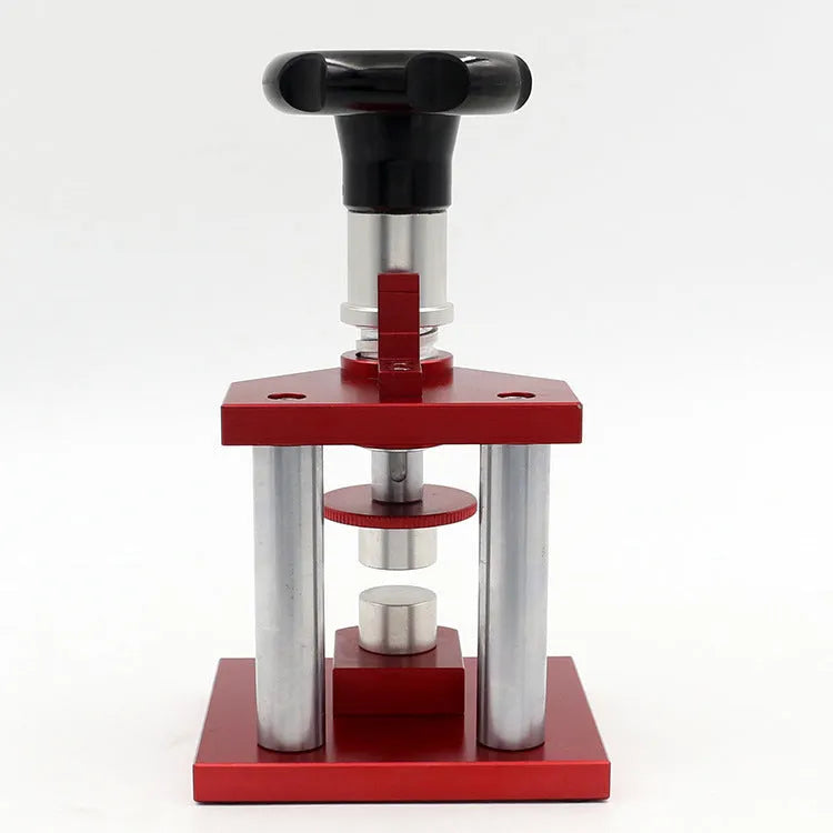Spiral cap presser watch repair tool with a set of 20 plastic moulds for watch back covers.