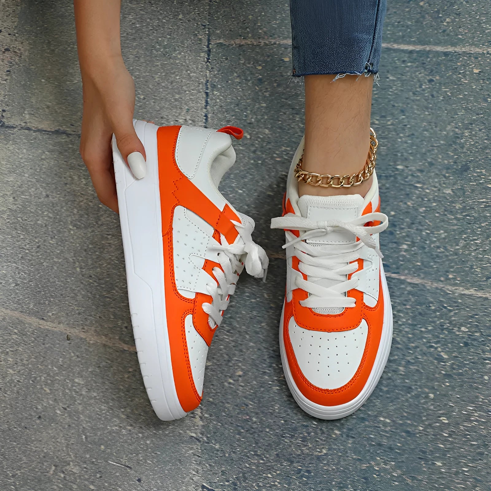 Pair of solid colour low heel lace-up board shoes with artificial PU upper and rubber sole