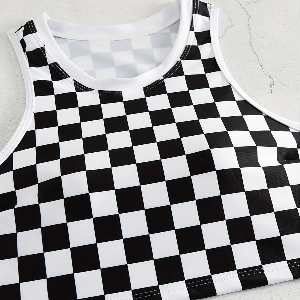 Women's black and white checkerboard plaid backless racing swimsuit with suspender straps.