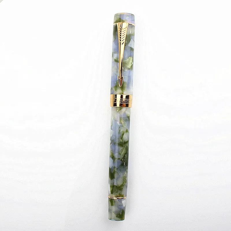 Deep bath green metal ballpoint pen with three interchangeable nib options shown