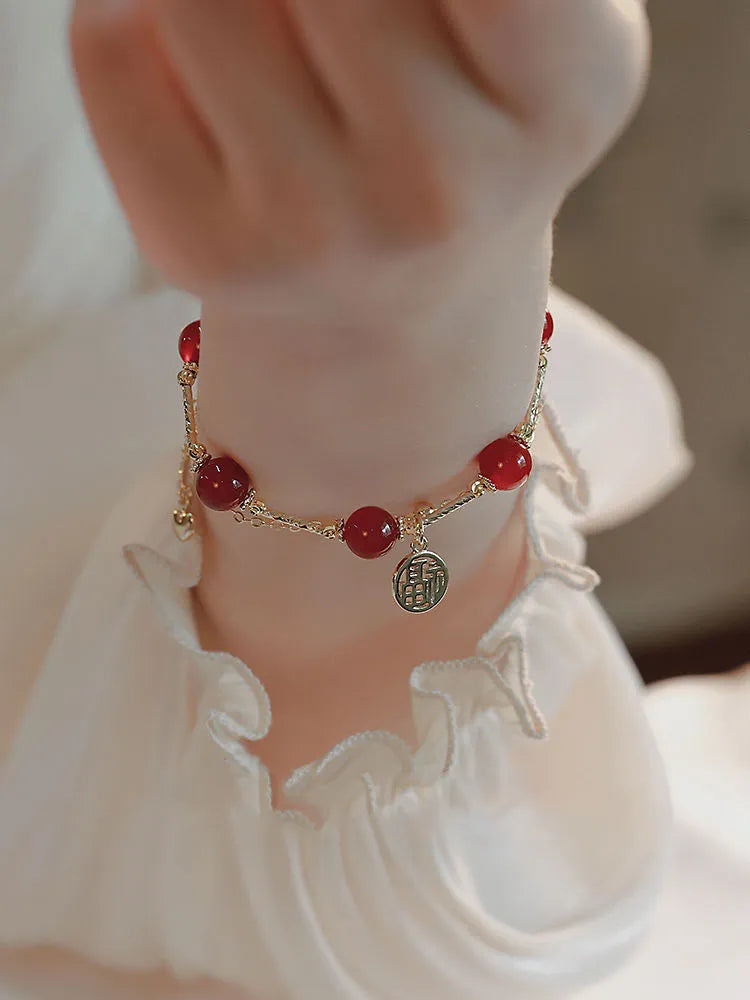 Red Agate bracelet with Red Horse blessing card motif on electroplated alloy double-layer design