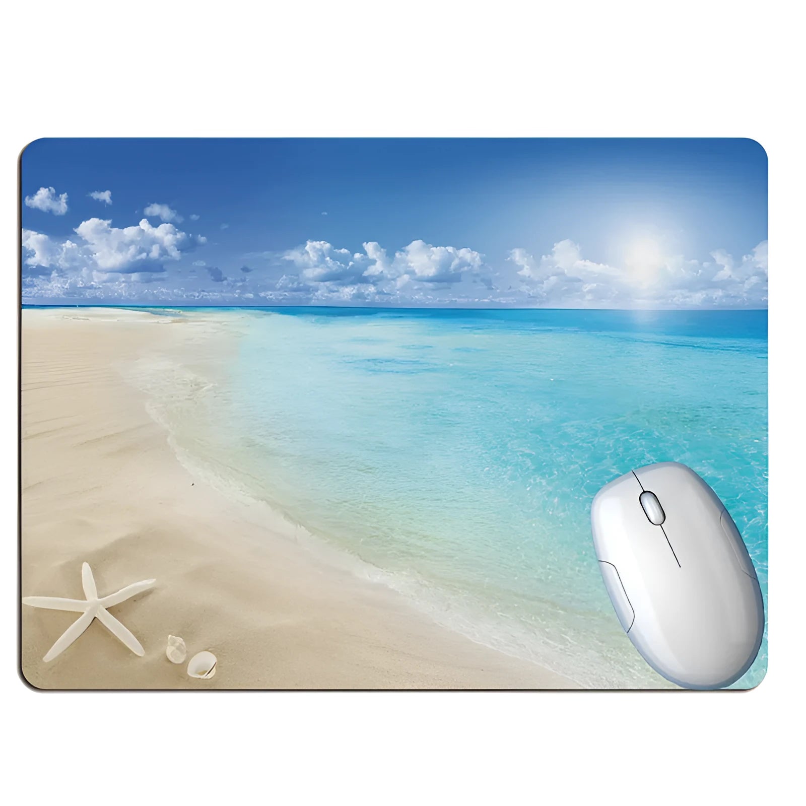 A wishing bottle and beach scene printed on a rubber mouse pad on a wooden desk.