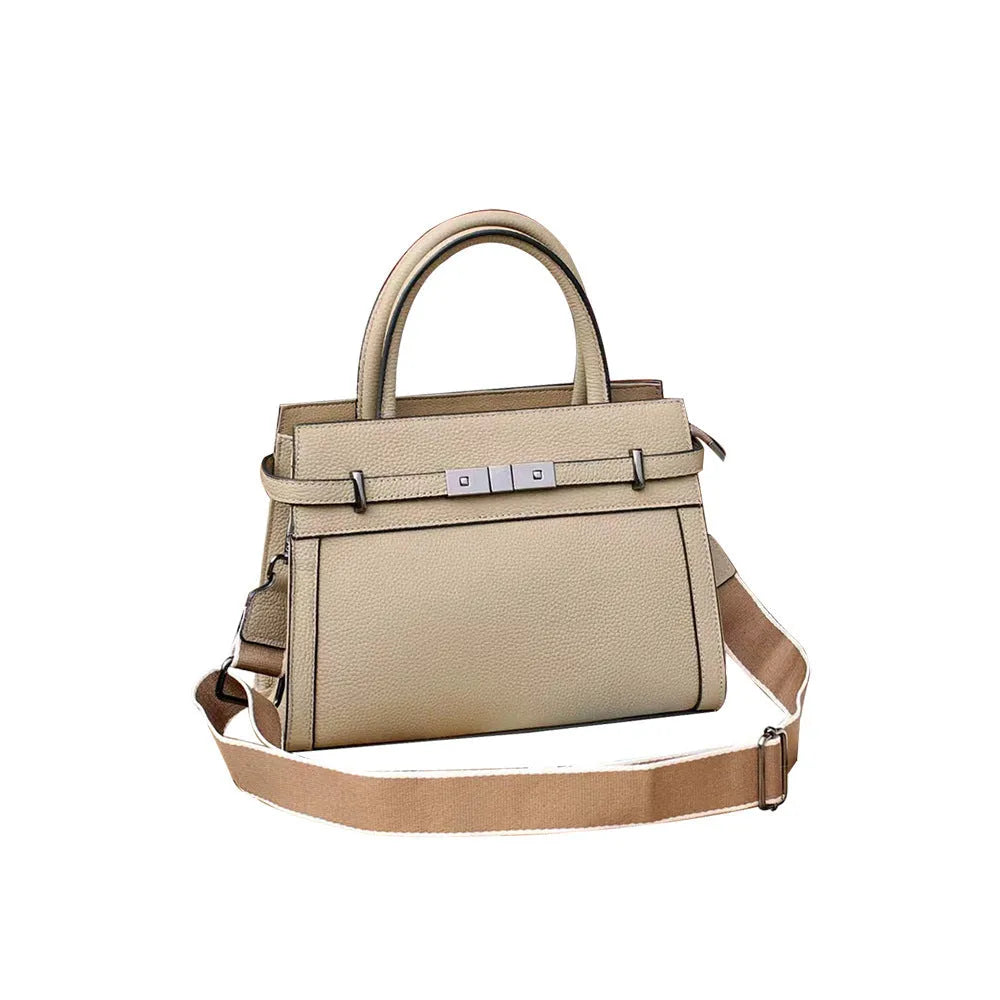 Small square horizontal genuine leather shoulder bag in almond green with visible stitching and shoulder strap