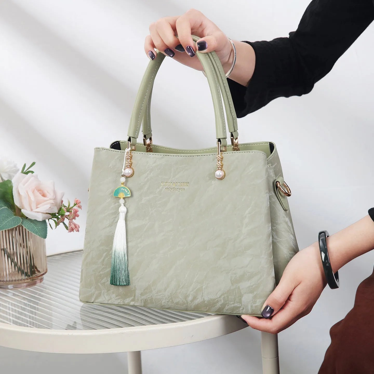 Women's large square shoulder bag in PU leather with a slit pocket, shown in beige colour.