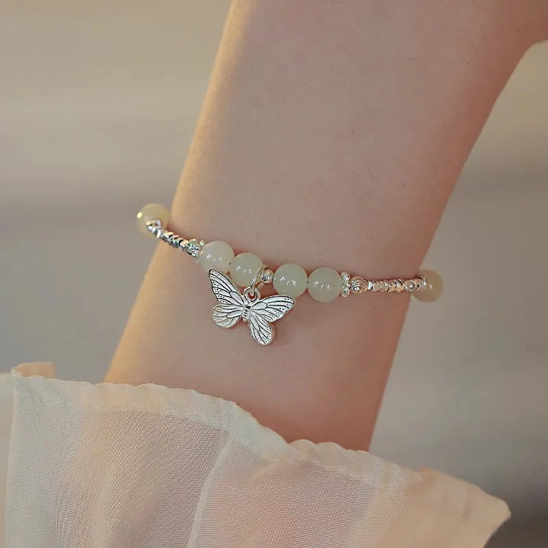 Hetian jade silver butterfly bracelet and necklace set with electroplated copper construction