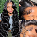 Black synthetic long wave wig with lace front on a mannequin head, showing pre-plucked hairline