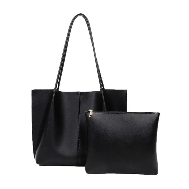 Women's large capacity PU shoulder bag in black with double straps and sewing thread detail