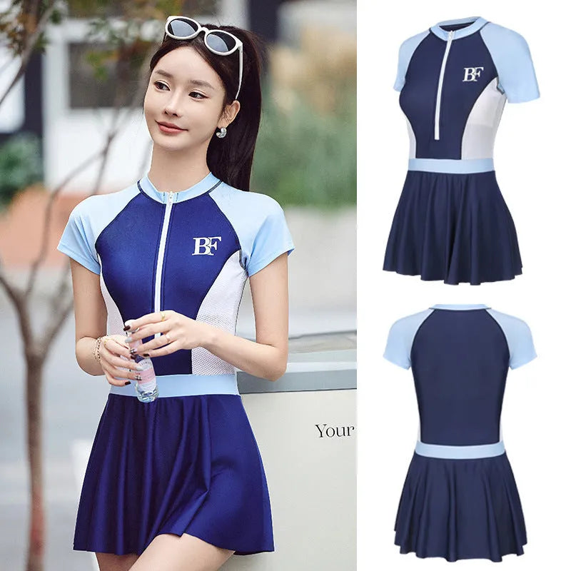 Conservative ladies sports one-piece swimsuit with colour-matched pattern for athletic activities