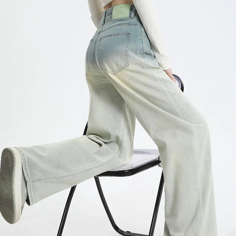 Women's gradient blue wide-leg straight-leg cotton denim trousers on a hanger.