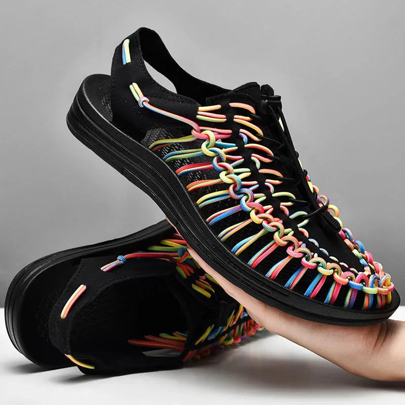 Woven sandals with an elastic drawstring tie closure in a rainbow colour option