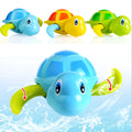 Plastic swimming turtle bath toy with brain game element for water play