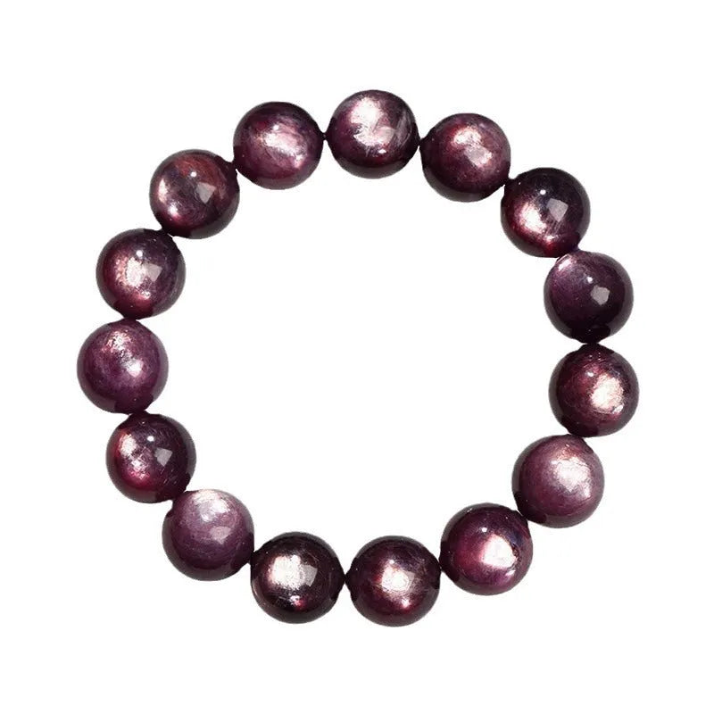 Purple lepidolite crystal round beads bracelet on a wrist, showing polished gemstone beads.