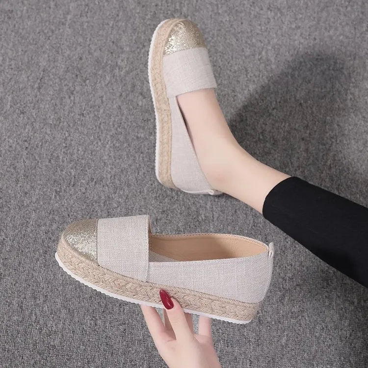 Plus size canvas flats in breathable cloth with round toe design and slip-on construction