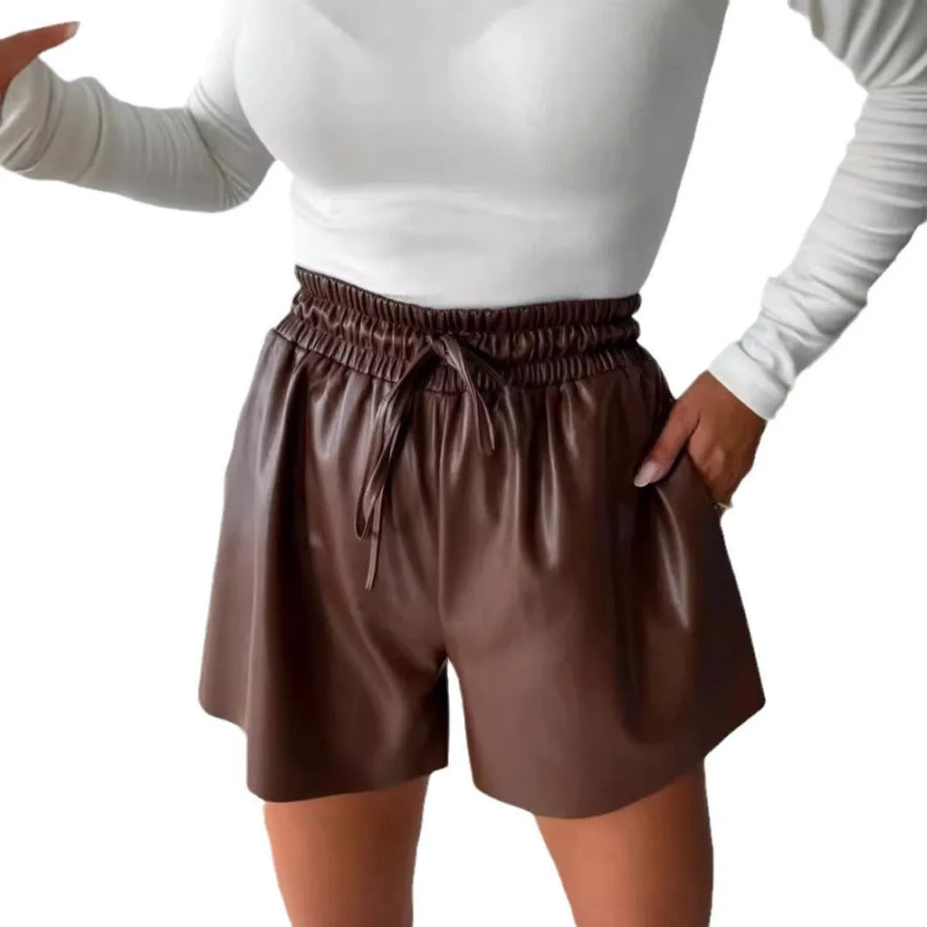 Black wide-leg women's shorts with a front lace-up drawstring detail on the waist.