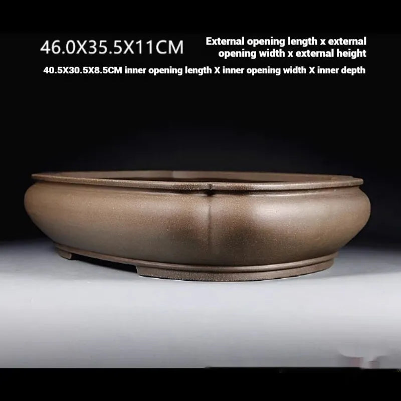 Handmade antique papaya-shaped purple clay flower pot, 46cm long.