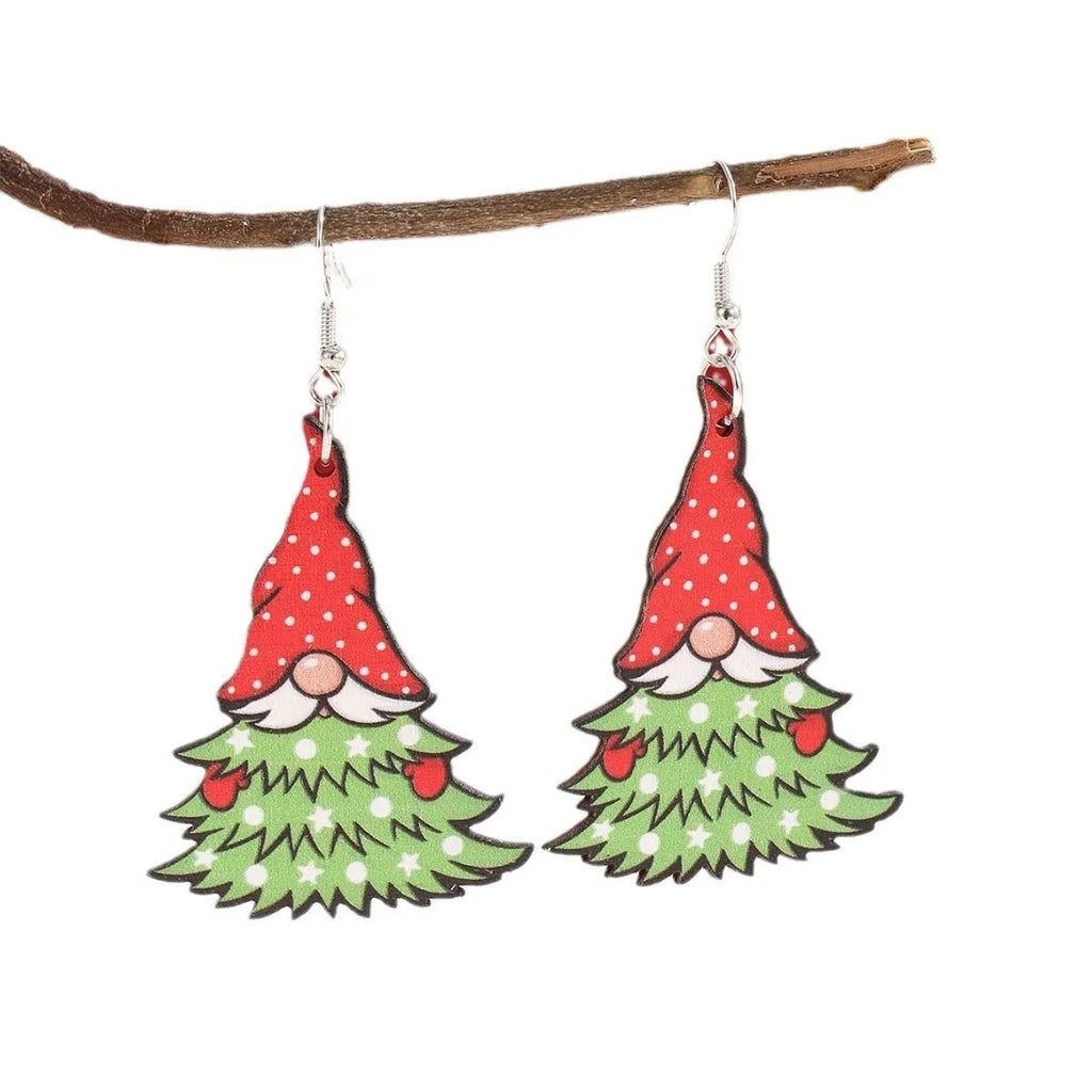 Pair of wooden geometric Christmas earrings with Santa Claus design in red and green colours.