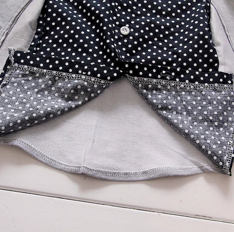 Kids blue cotton blend sport suit set with zip jacket and elasticated waist trousers on a hanger.