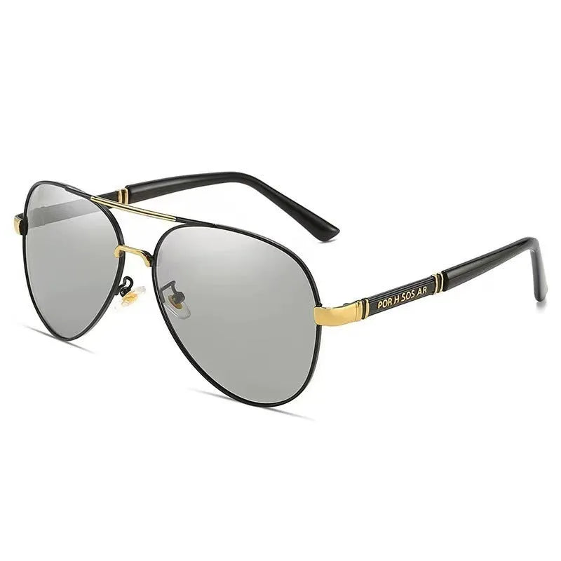 Gold metal framed polarised sunglasses for men with dragon motif on arms and grey lenses.