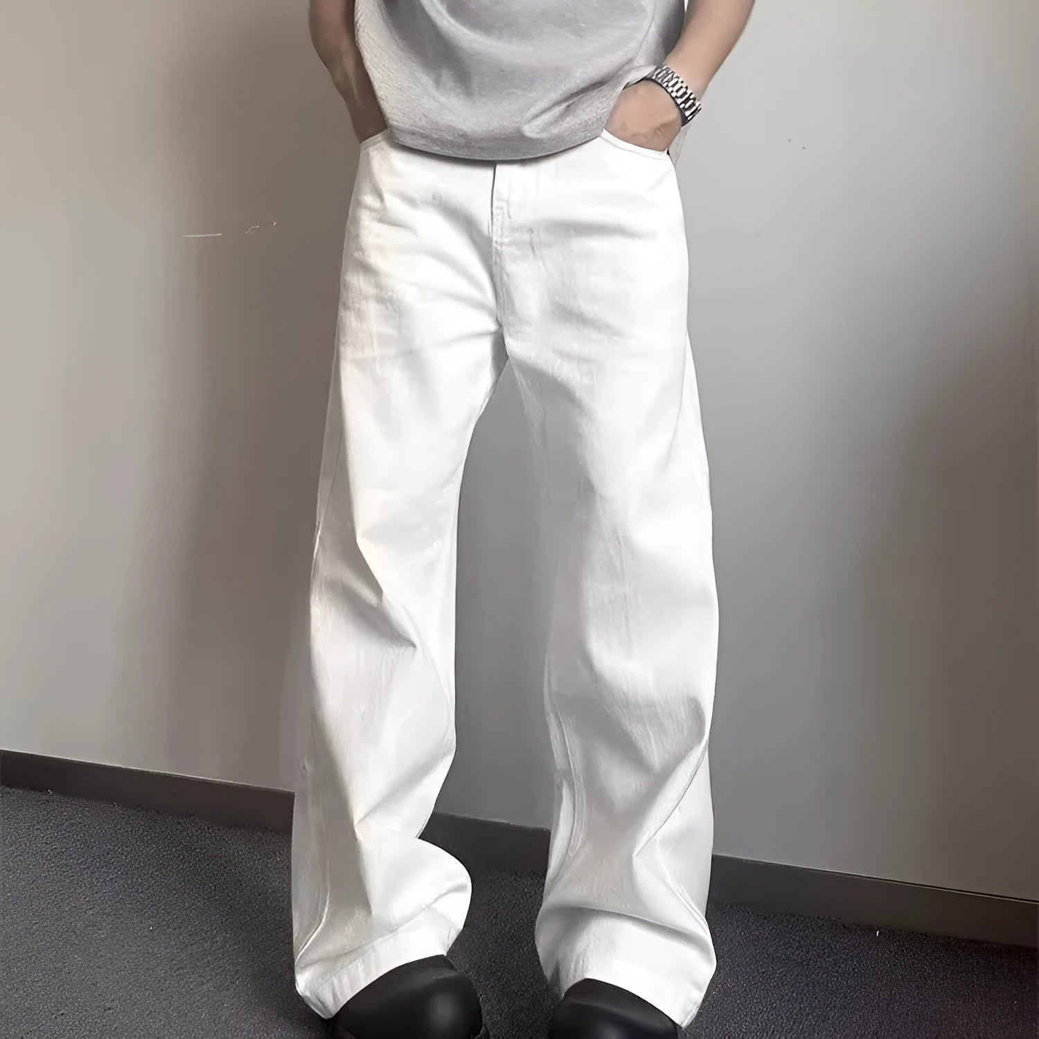 Men's straight wide-leg loose fit white denim jeans on a mid waist.