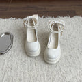 Beige women's Mary Jane pumps with a chunky 6cm heel and rounded toe on a white background.