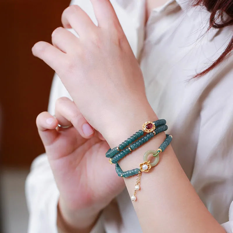 Blue water jade abacus bead bracelet with three rings of tourmaline and freshwater pearls, bead diameter under 4mm