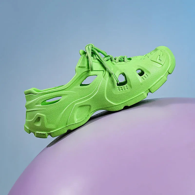 Pair of bright green EVA sandals with a thick, moulded sole and simple strap design.
