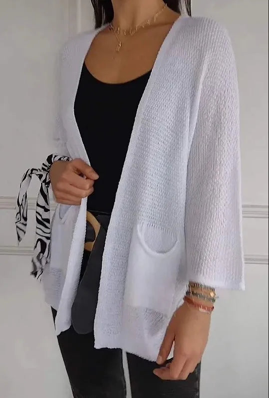 Women's waffle texture cardigan coat with nine-quarter sleeves shown in army green colour.