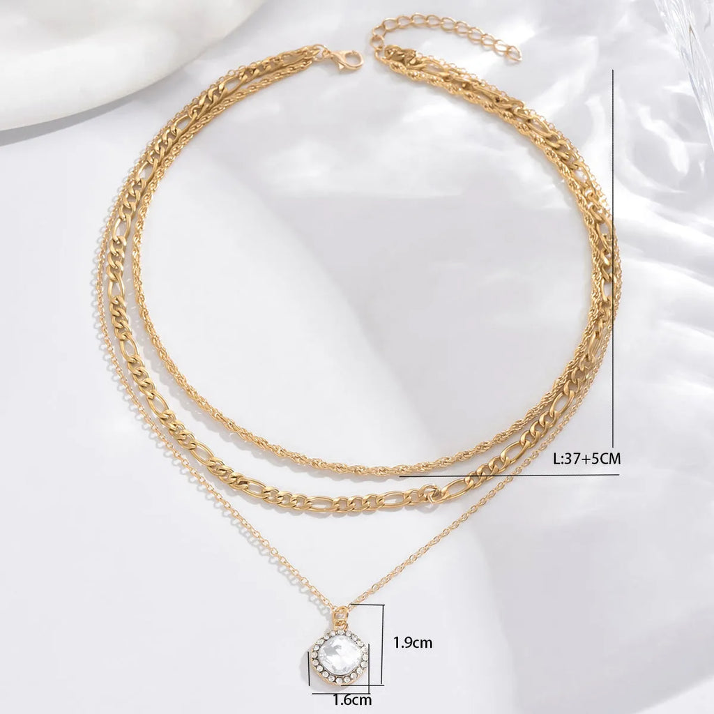 Gold multi-layer pendant necklace with large hemp flowers chain and round geometric pendants on alloy base