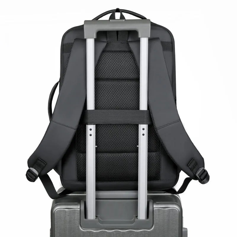 Men's black waterproof backpack with curved shoulder straps and 20-35L capacity for business travel