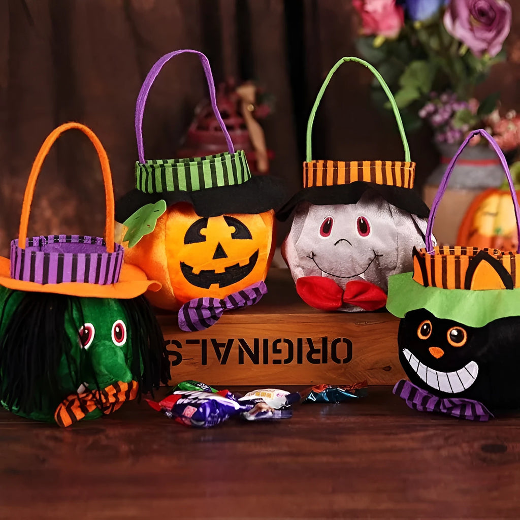 Square black Halloween candy bag with a pumpkin pattern, held by a handle.