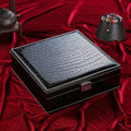 Green wooden double layer jewelry storage box with lock and crocodile pattern texture.