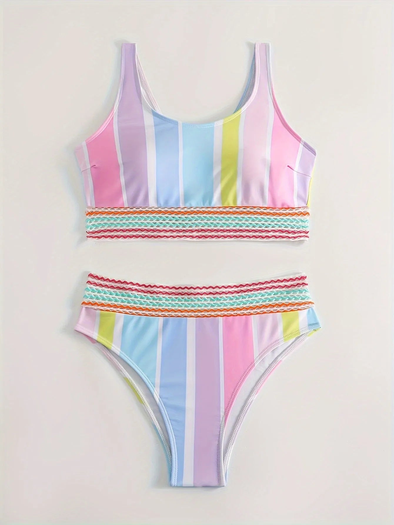 Women's striped bikini set in picture colour, showing top and briefs for swimming sports.