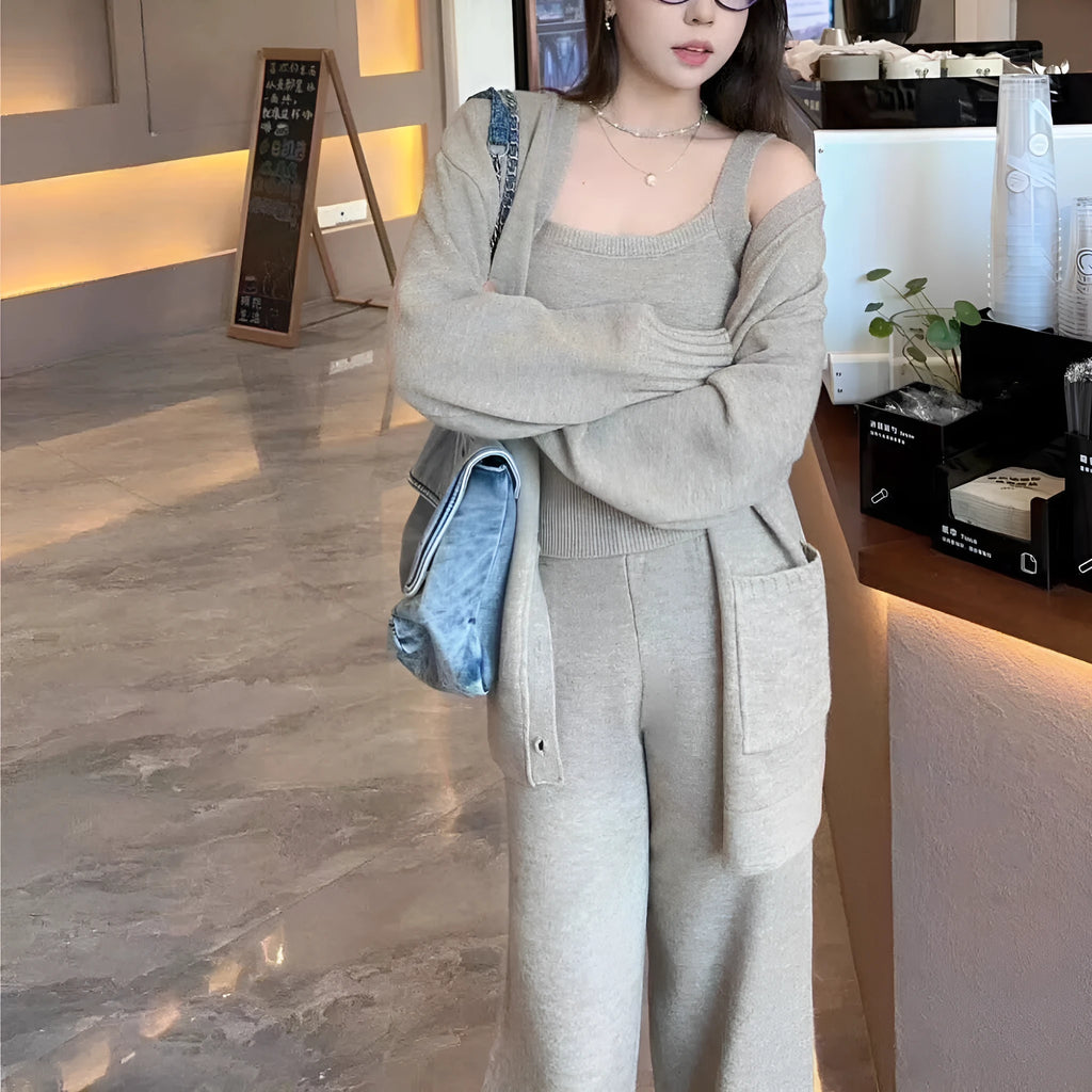 Women's knit three-piece set with cardigan, vest, and suspender pants in wool blend fabric