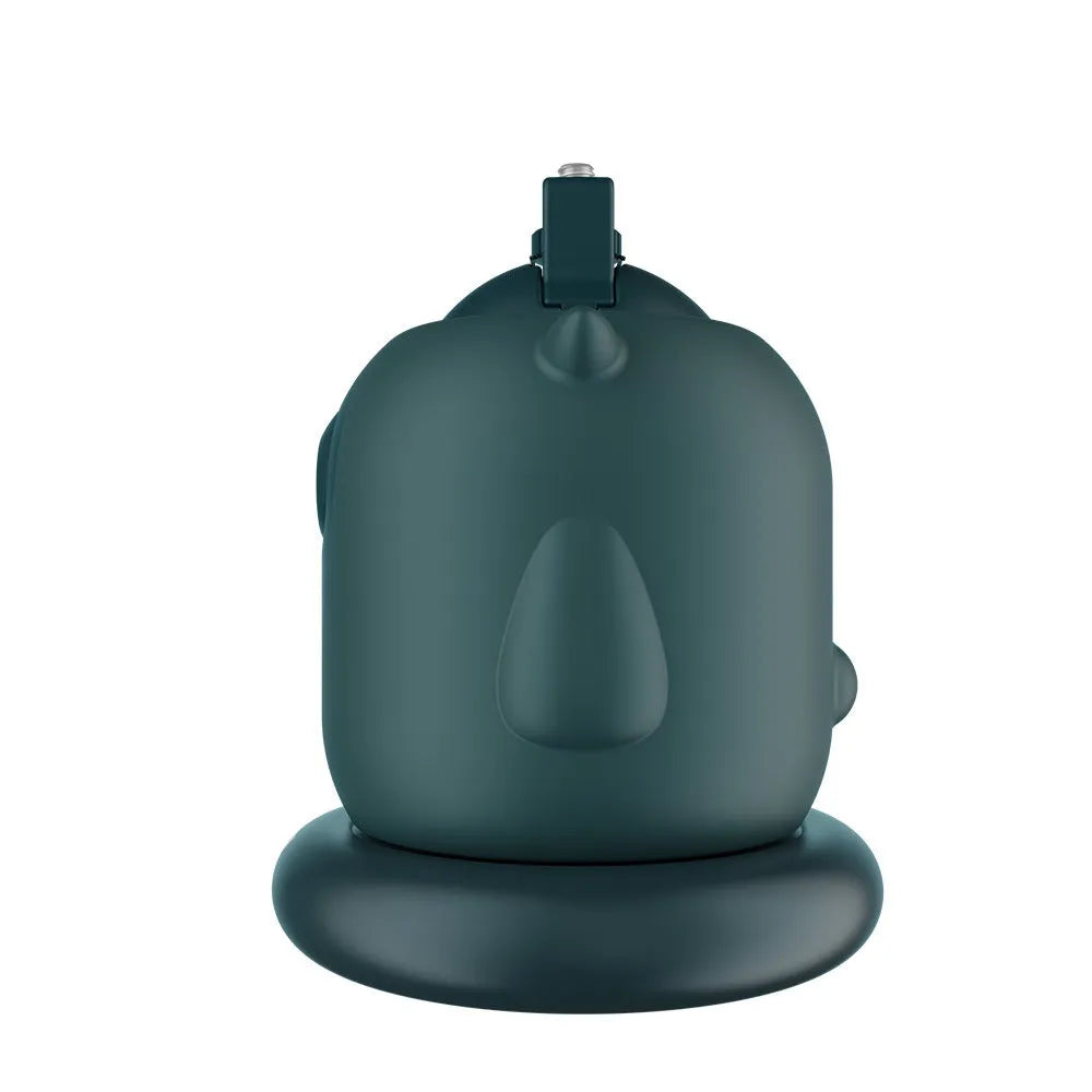 Dark green intelligent AI tracking gimbal with 360 rotation on a desktop.