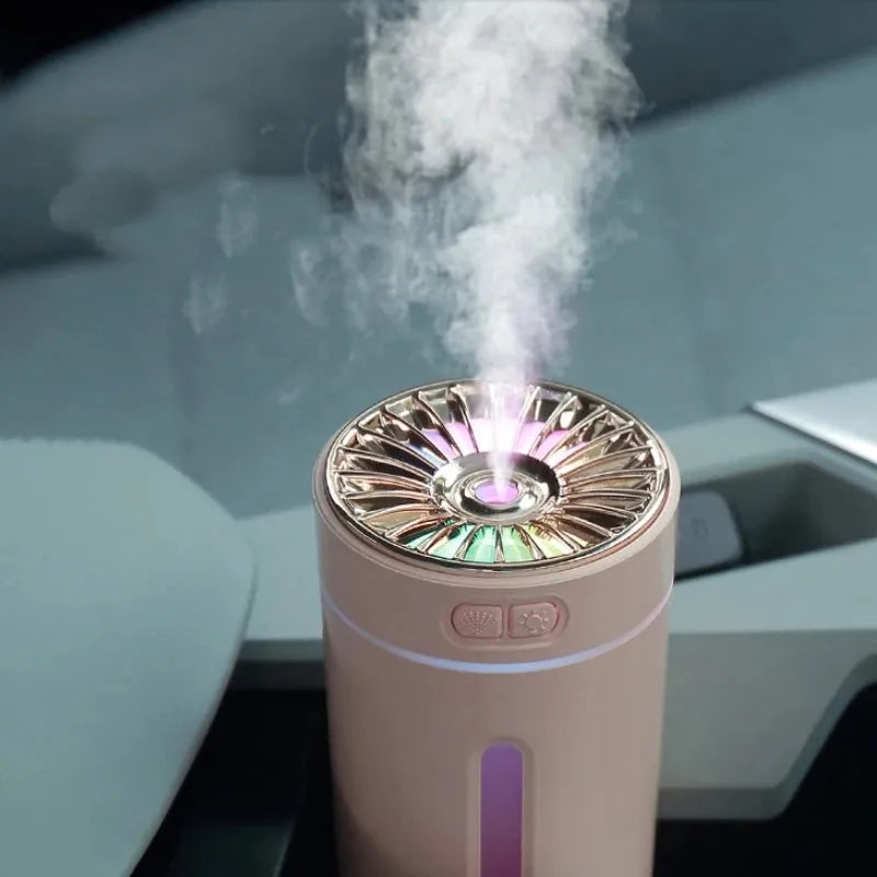 Black portable USB rechargeable humidifier with colourful LED lights on car cup holder